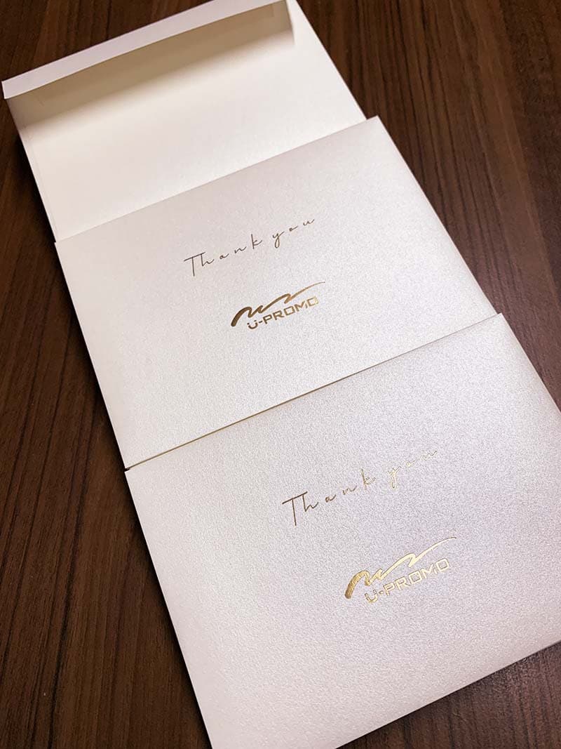 商品券用のゴールド箔押し封筒デザイン